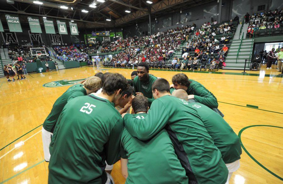 Tulane+mens+basketball+huddles+before+the+exhibition+game+against+Loyola.%C2%A0Counting+the+two+graduating+seniors+in+guard+Jay+Hook+and+forward+Tre+Drye%2C+eight+players+are+leaving+head+coach+Ed+Conroys+program.%C2%A0