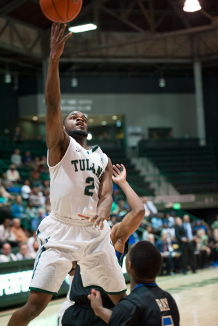 Sophomore guard Jonathan Stark shoots a floater in the 62-55 loss to Tulsa Feb. 25 in Devlin Fieldhouse. Stark averages 11 points per game and 4.3 assists. 
