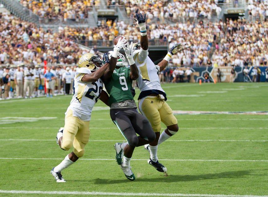 Tulane sophomore wide receiver Teddy Veal attempts to catch a pass against double coverage during its 65-10 loss to Georgia Tech on Sept. 12.