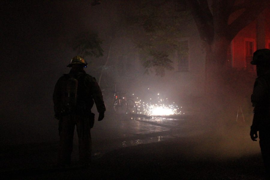 Sparks fly from a downed power line in connection to the garage fire around 11 p.m. Saturday night near Clara and Nashville.