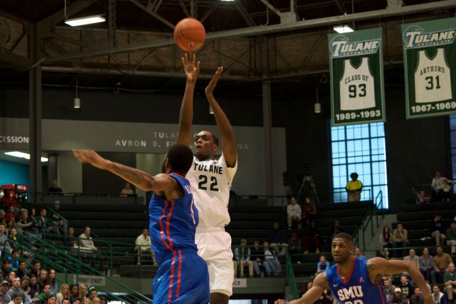 Graduate student forward Jernard Jarreau attempts a shot as a SMU player tries to block him in the Tulane 64-45 loss against SMU on Jan. 17 in Devlin Fieldhouse. 