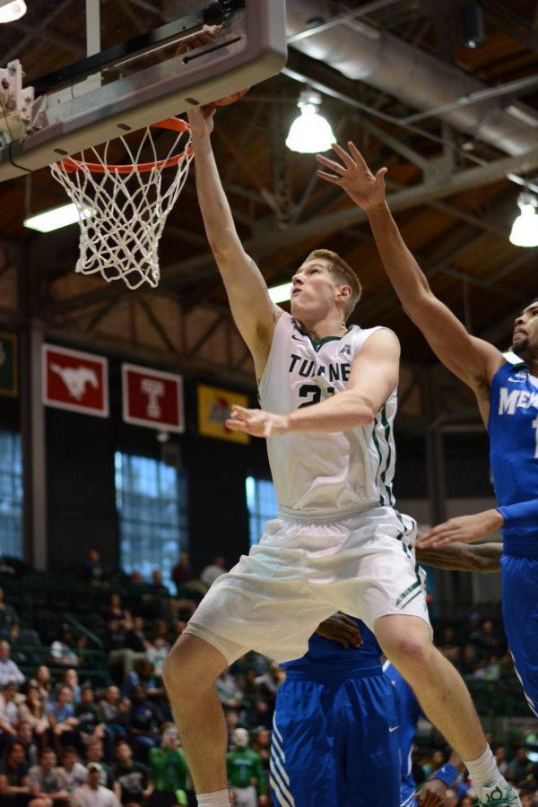 Sophomore forward Dylan Osetkowski goes for a layup in Saturdays matchup against Memphis in Devlin Fieldhouse. The Wave ousted the Tigers 94-87 in Overtime. Osetkowski had career-high of 23 points, also notching his ninth double-double of the year with 13 rebounds