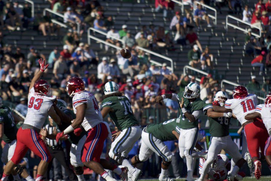 Sophomore quarterback Glen Cuiellette makes a play in the Green Waves game against SMU. 