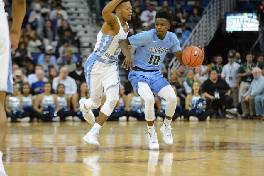 Sophomore guard Von Julien dribbles around a UNC defender as the teams clashed on Nov. 11 in the Smoothie King Center. 