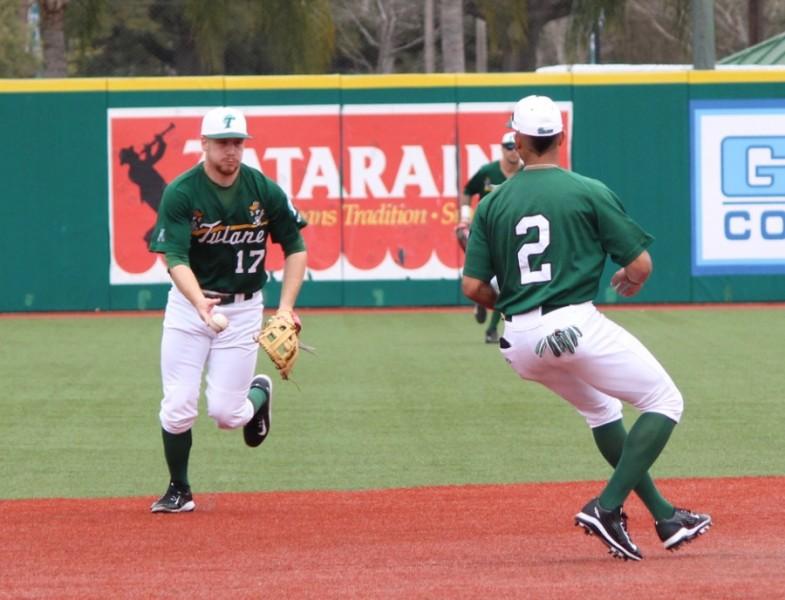 Senior infielderJake Willsey readies a pass to freshman outfielder Kobi Owen during a practice before their opening weekend. Willsey started all three games for the Wave, finishing with one hit and two stolen bases overall.