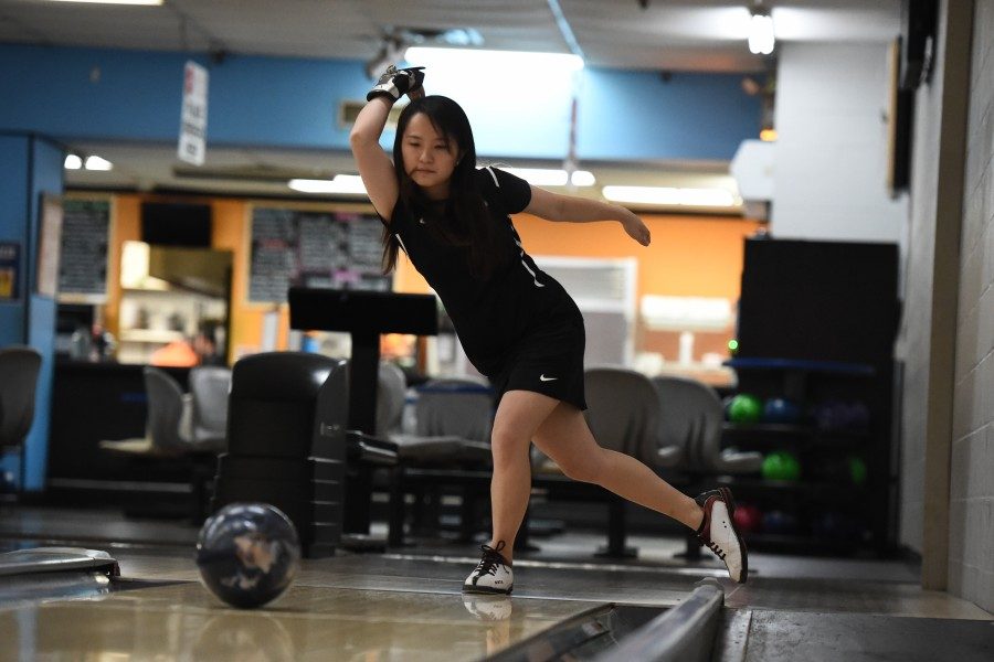 Michelle Ng sends a ball rolling down the lane. 