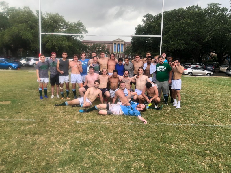 Tulane Rugby Football Club smiles for a team photo. 