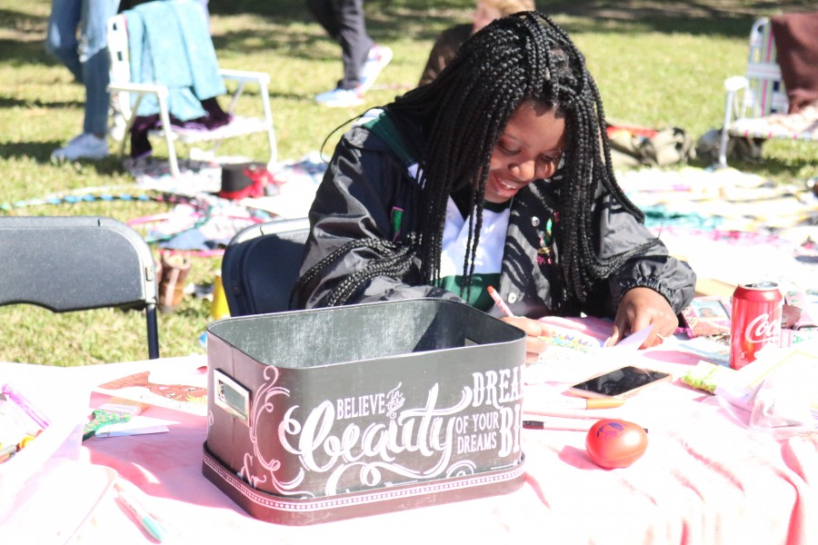 Student participates in activity at the Celebrate Mental Health Festival this Saturday.