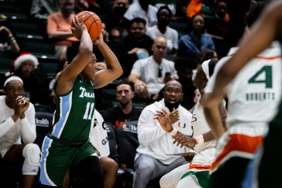 Graduate transfer Moon Ursin looks to make a pass against the Miami Hurricanes.