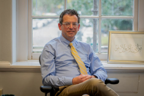 Brian Edwards, dean of Tulane's School of Liberal Arts, seated at a window in his Newcomb Hall office.