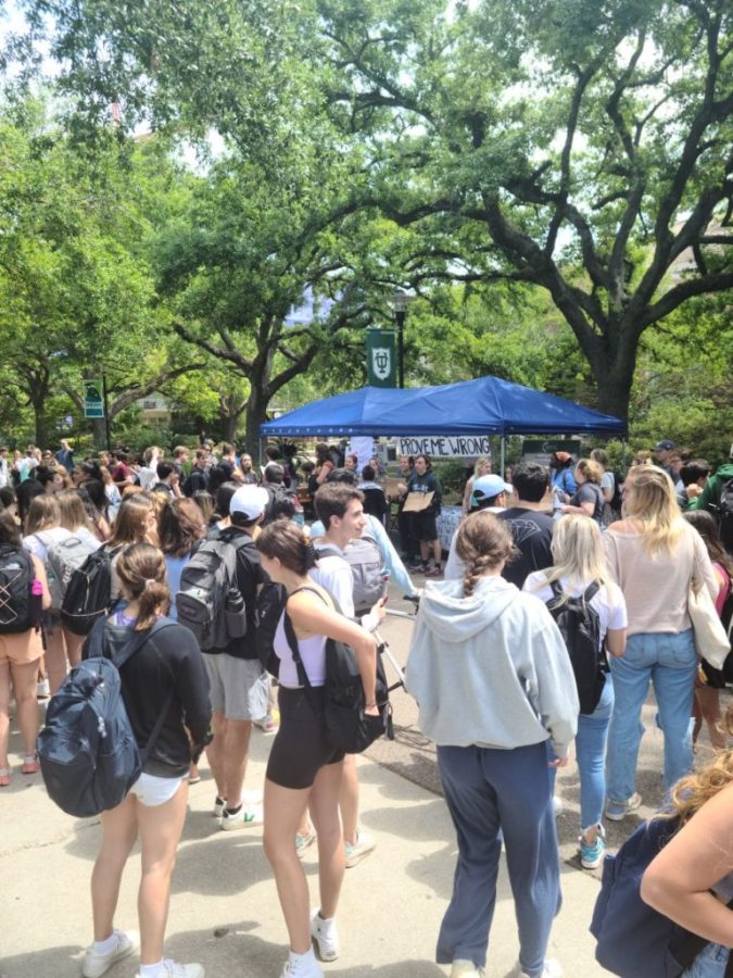 Students gathered on McAlister Place last spring in front of student groups tabling. 