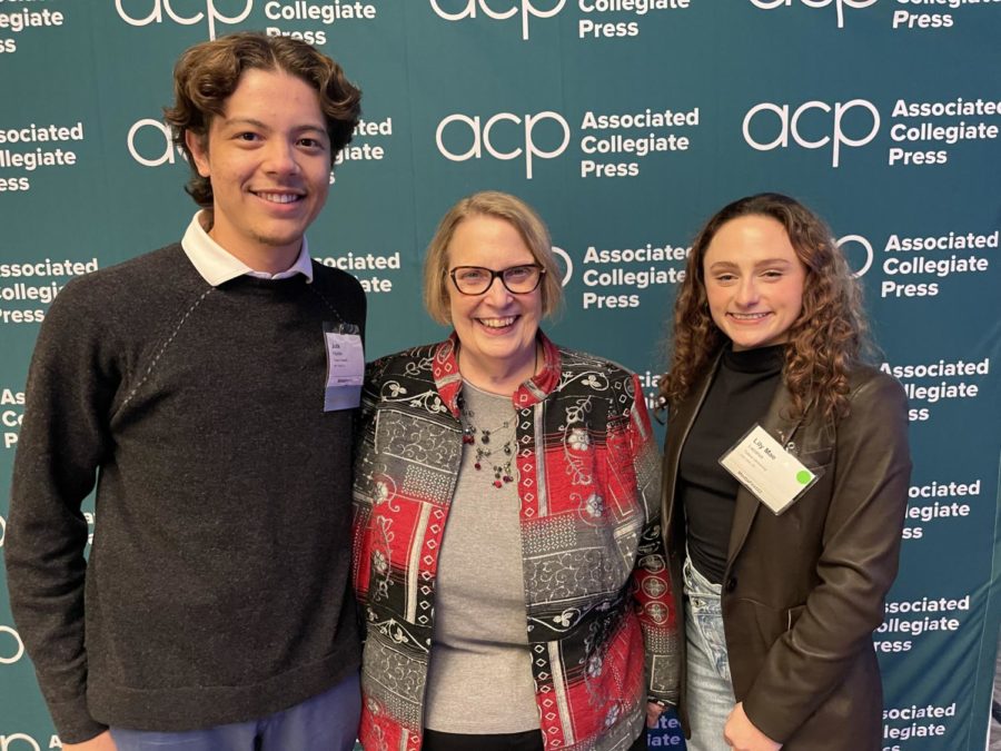 Current Hullabaloo editor Jude Papillion and former managing editor Lily Mae Lazarus are awarded National Pacemaker by ACP executive director Laura Widmer at MediaFest 22 in Washington, D.C. 