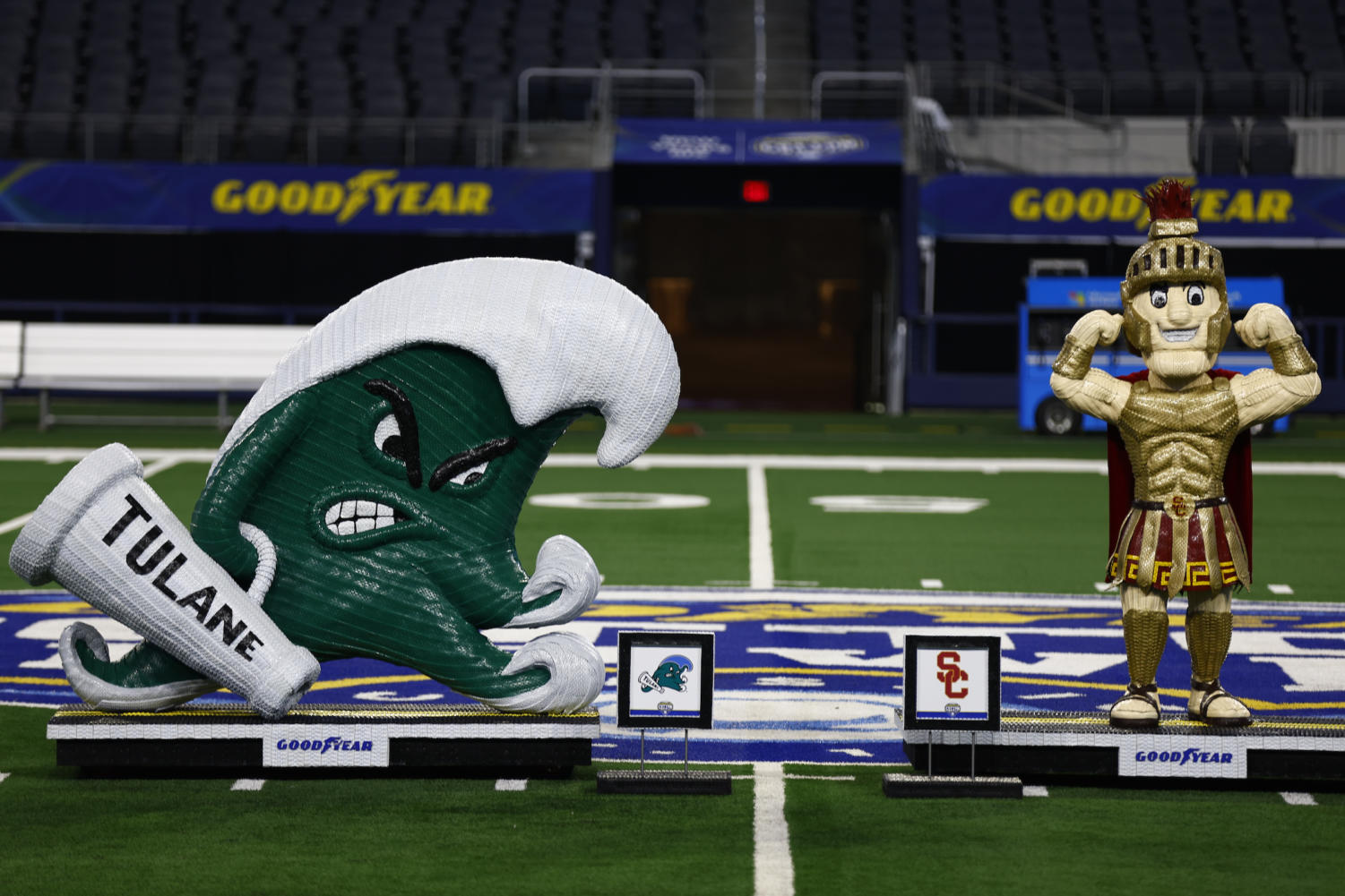 Goodyear Tire honors Tulane, USC with sculptures