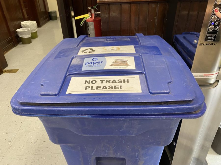 A recycling bin in Hebert Hall warns against depositing non-recyclable items.