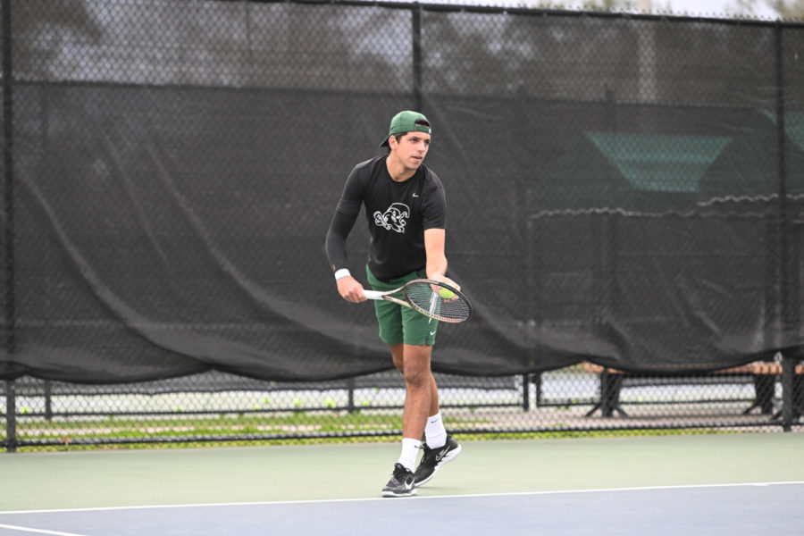 Luka Petrovic gets ready to hit his serve.
