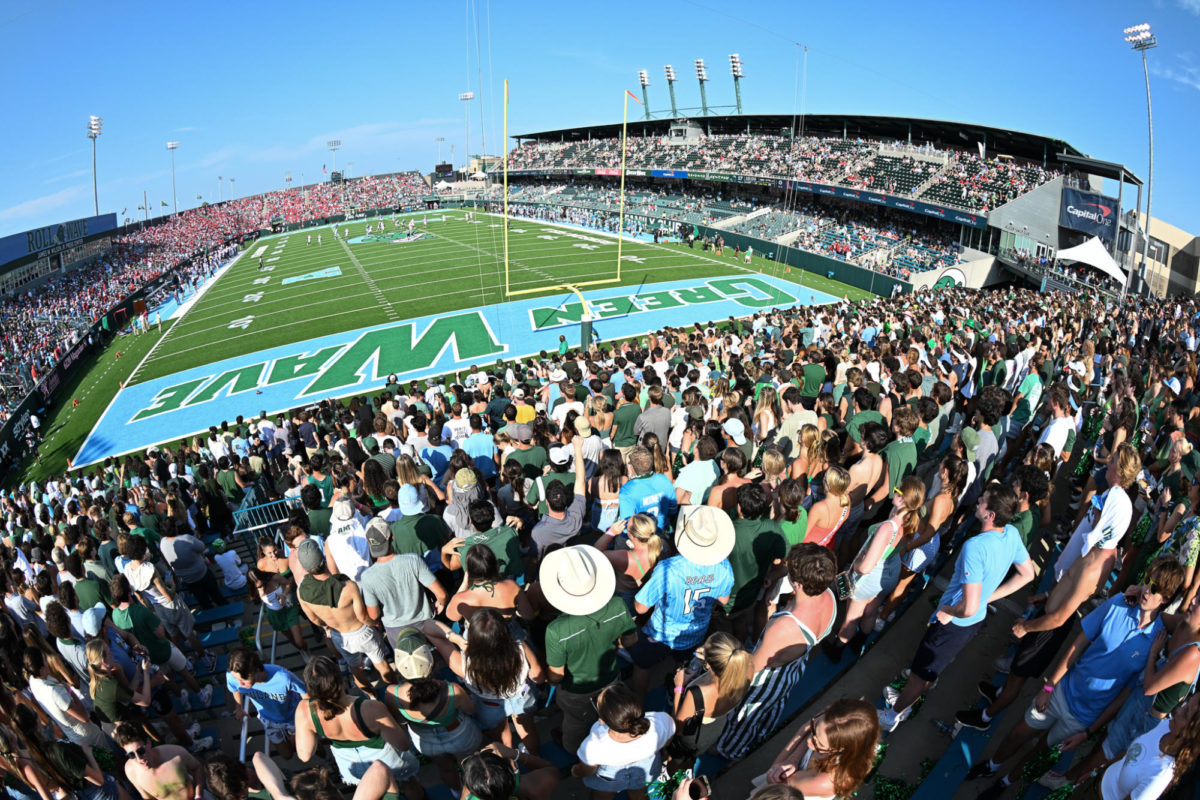 At+the+historic+Ole+Miss+rivalry+game%2C+students+rushed+and+packed+the+student+entrance%2C+prompting+Tulane%E2%80%99s+new+student+ticket+policy+for+upcoming+home+football+games.