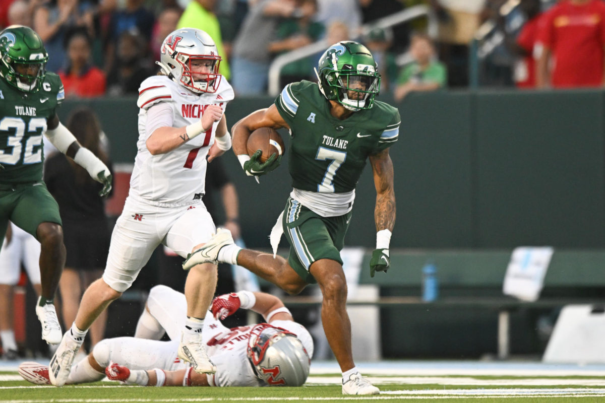 Lance Robinson races past a Nicholls State player during the matchup at Yulman Stadium on Sept. 23, 2023. 