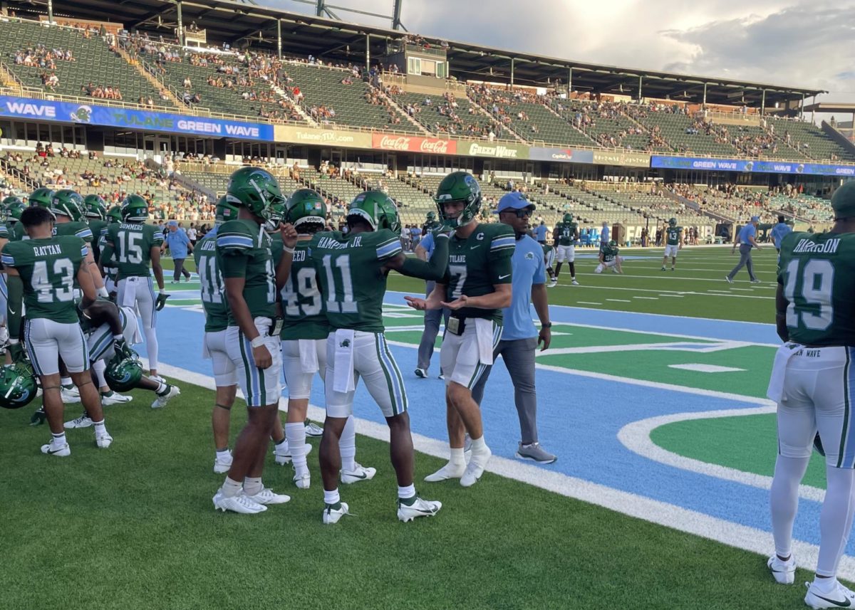 Quarterback Michael Pratt talks with teammates ahead of a game against the University of Southern Alabama on Saturday, Sept. 2, 2023 at Yulman Stadium. 