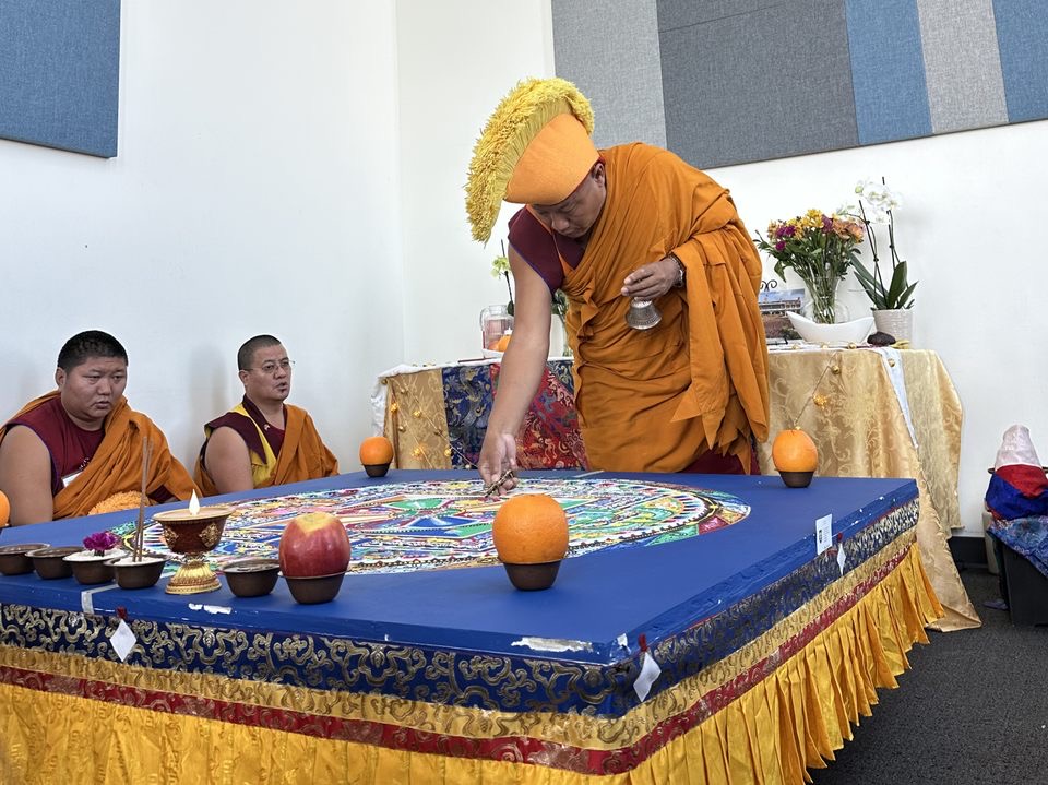 Over the span of five days, monks from the Drepung Gomang Monastery worked together in the meticulous creation of a sand mandala on the fifth floor of the Howard-Tilton Memorial Library. On Saturday morning, it was wiped away with several swipes of a paintbrush. 