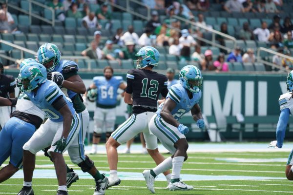 Quarterback Kai Horton led the first unit on offense in the spring football game 
