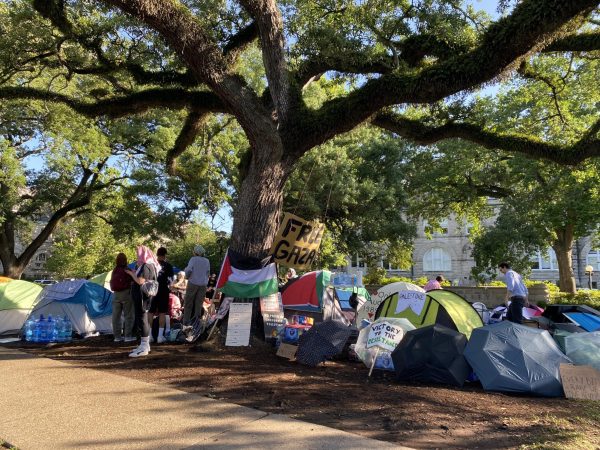A tent encampment that formed Monday night at Tulane University remained in place Tuesday morning, despite several warnings from the university that protesters are illegally trespassing and would be arrested. 