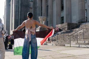 Pro-Palestinian protestors stood in front of the courthouse on Friday before filling the courtroom.