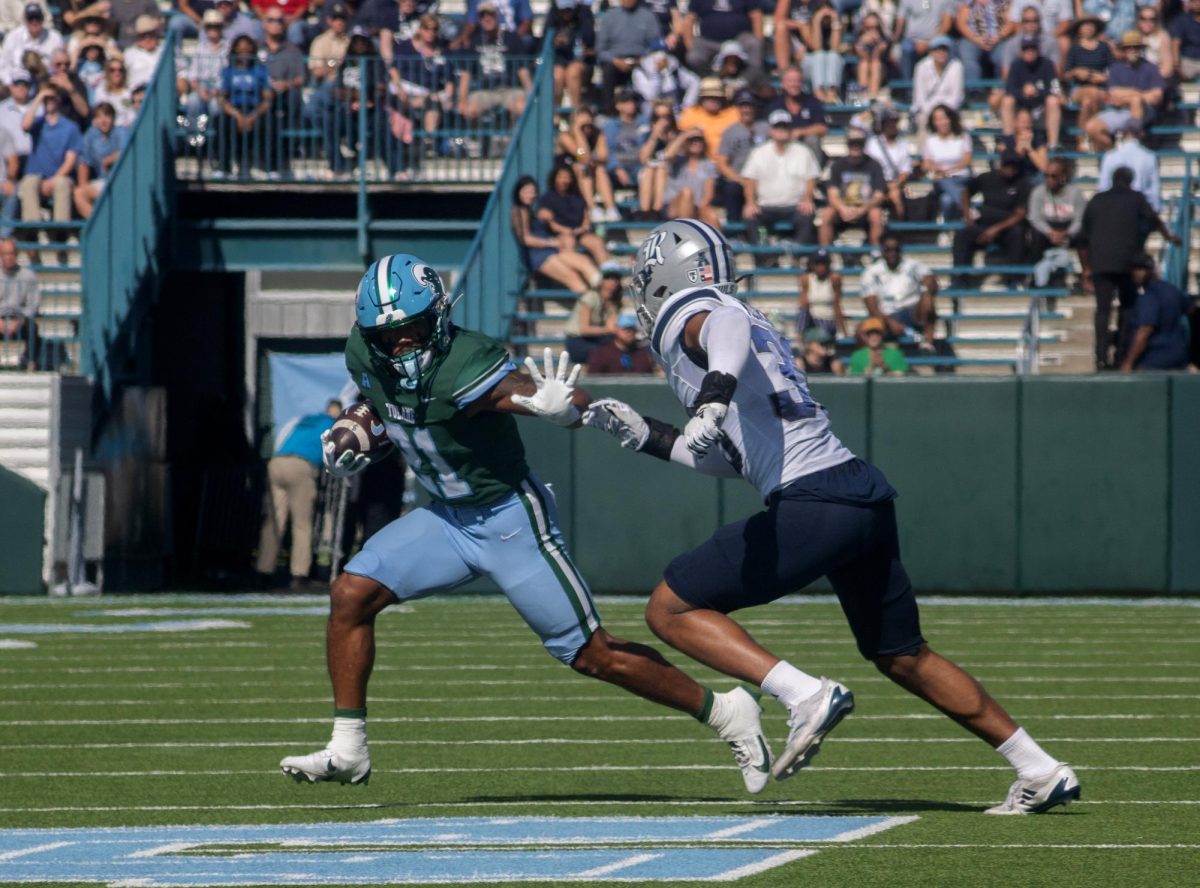 Makhi Hughes powered Tulane past Rice on Saturday.