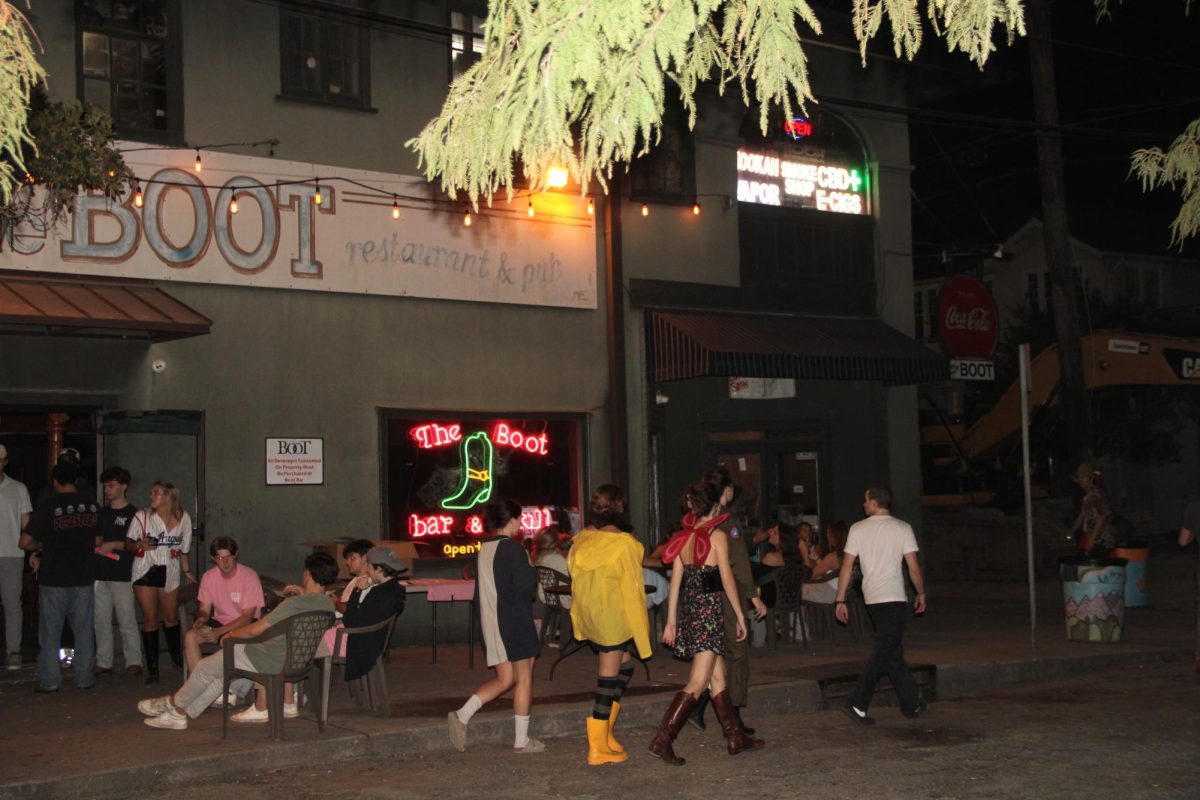 Students outside the Boot Bar & Grill near campus.