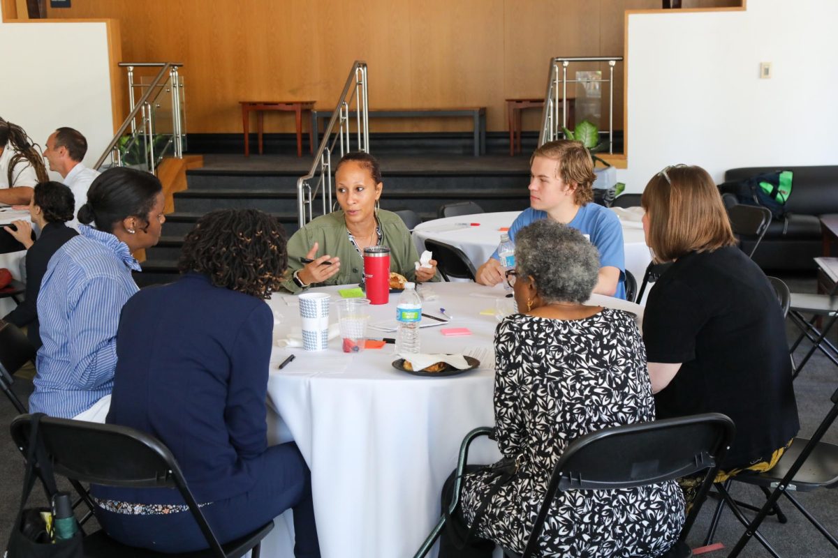 Tulane staff and faculty discuss artificial intelligence during a community event.