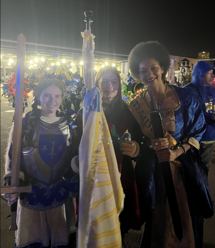 Marley Marsalis, 2024 Joan of Arc maid from Orléans France Maïlys Boët (middle), and 2025 Joan of Arc maid Life Sacco at the Joan of Arc Parade (from right to left). Courtesy of Marley Marsalis.