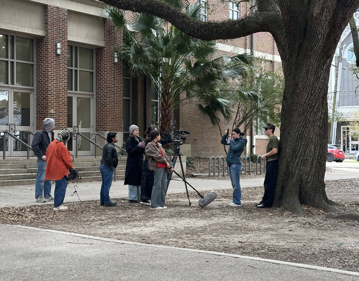 Digital Media Practices students work on a senior's capstone film. 