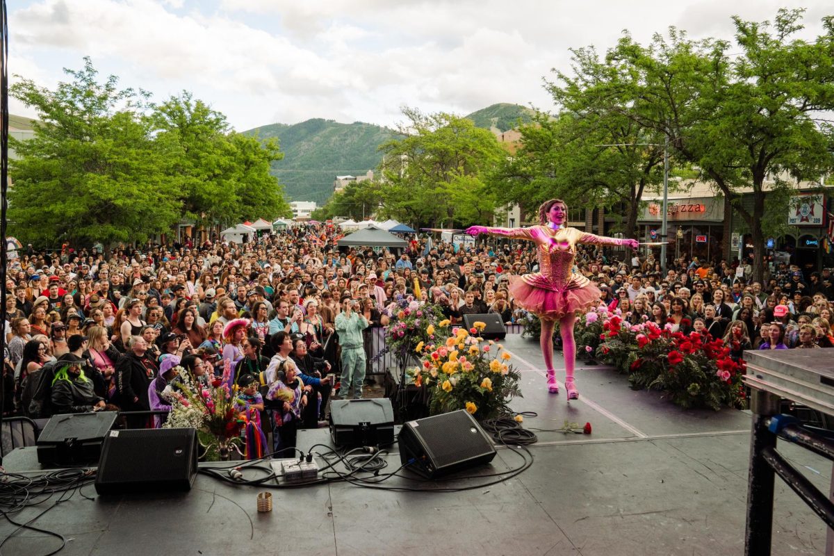 Joey Olsen, better know by Debbie with a D, performs on stage at a community event.