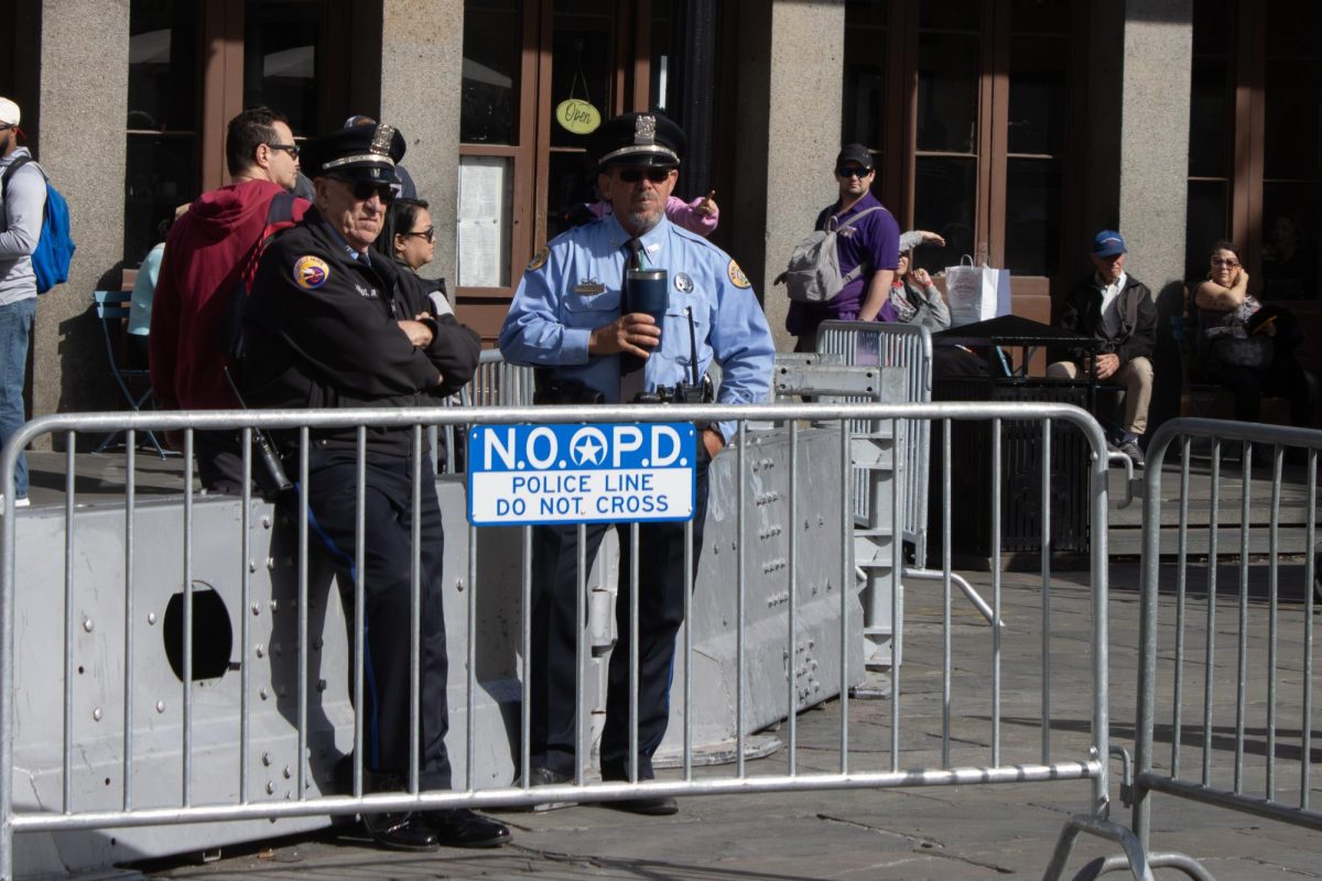 Two New Orleans Police Department officers stand guard at Jackson Square