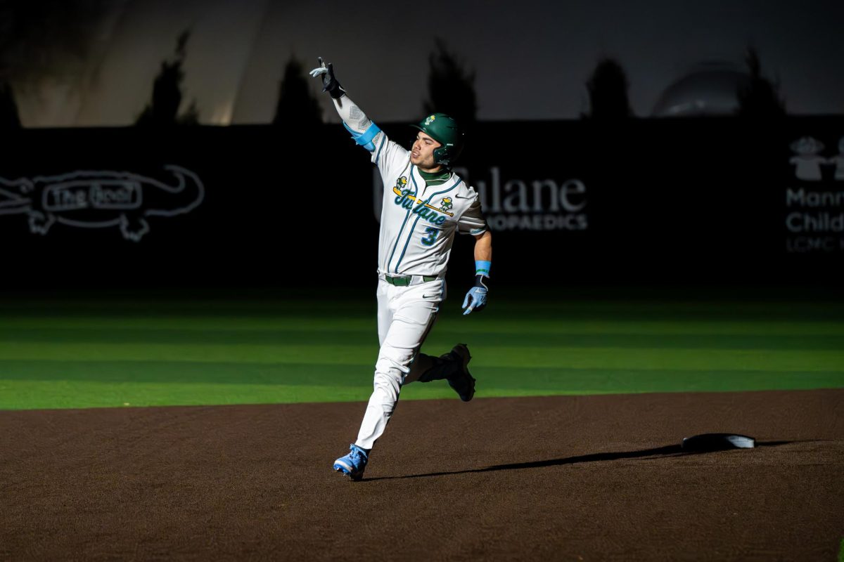 Shortstop Kaikea Harrison rounds the bases after a home run.